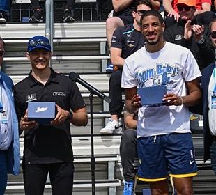 Big Crowd Salutes Starting Field at Public Drivers’ Meeting